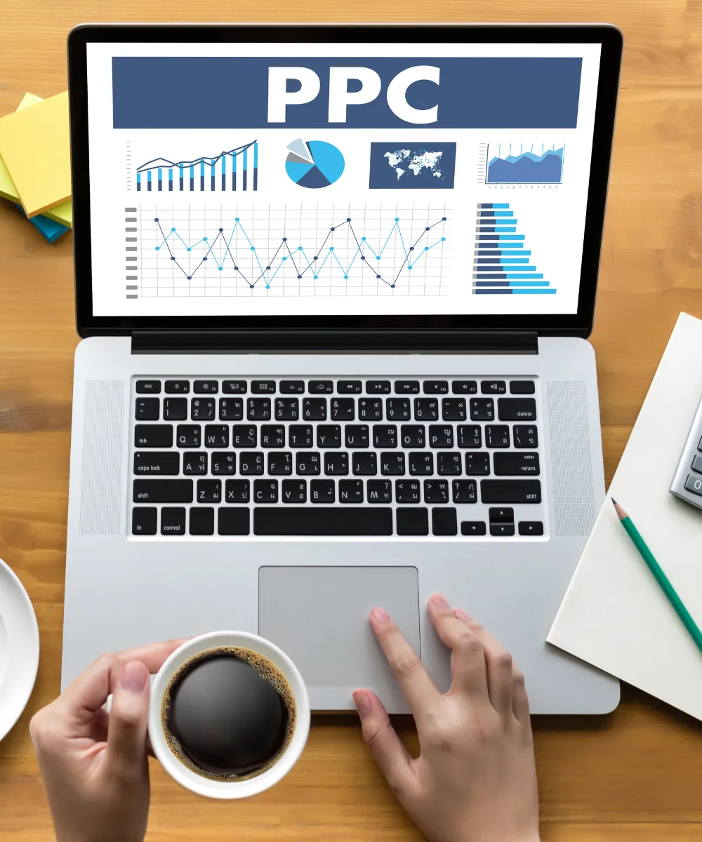 LeadGulls pay per click advertising specialists analyzing Google Ads and Facebook Ads performance data on dual screens showing cost per lead metrics